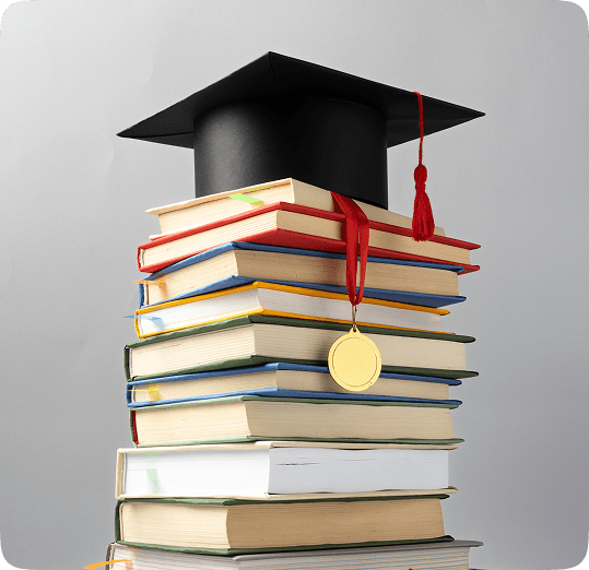 stacked books with a valectory cap on top